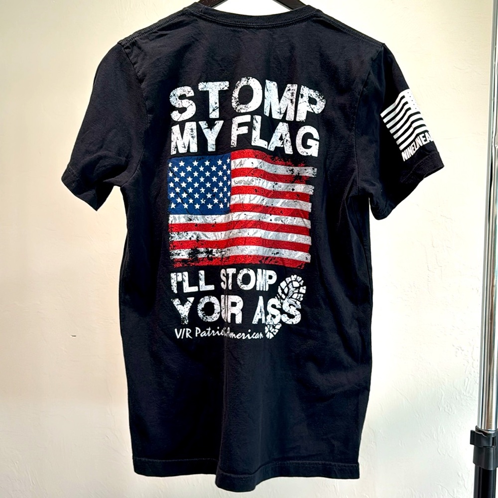 Nine Line T-Shirt, Size Medium. In Great Shape
